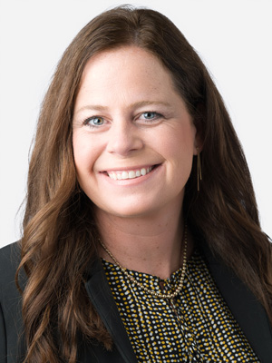 long brown haired caucasian woman smiling