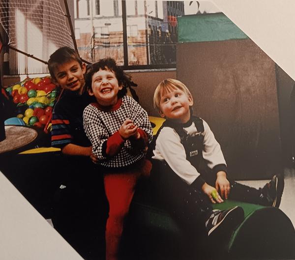 Scrapbook photo of Kirsten and her siblings
